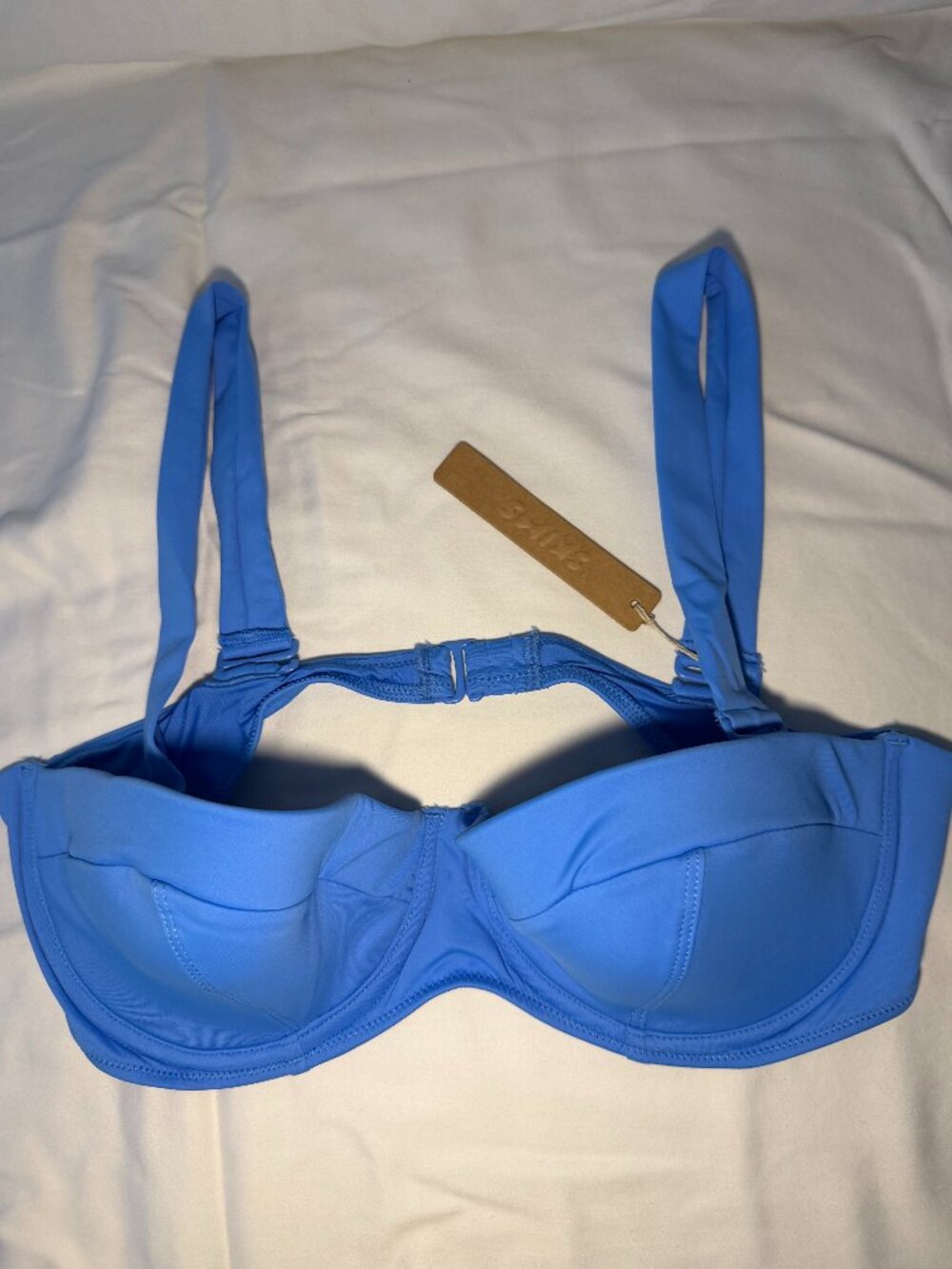 SKIMS SIGNATURE SWIM STRAPLESS UNDERWIRE BIKINI TOP
